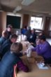 Lørdag d. 21.03.2015. Rømning af salen. Esther serverer kaffe med hjemmebag - en velfortjent pause til de mange frivillige. Foto: Vita Vinther.